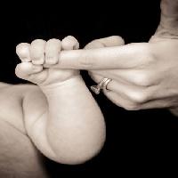 Pixwords The image with hand, baby, ring, hold Sarah Spencer - Dreamstime