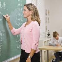 Pixwords The image with write, smile, woman, classroom, board, green Jonathan Ross - Dreamstime